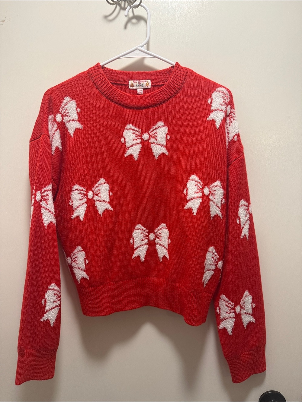 Women's Red Crewneck Sweater with White Bow Pattern